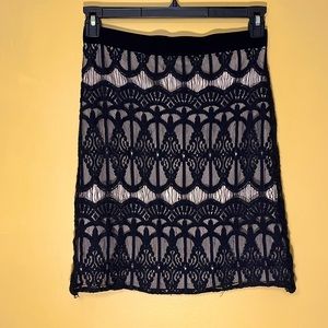 Black lace skirt with nude underlay